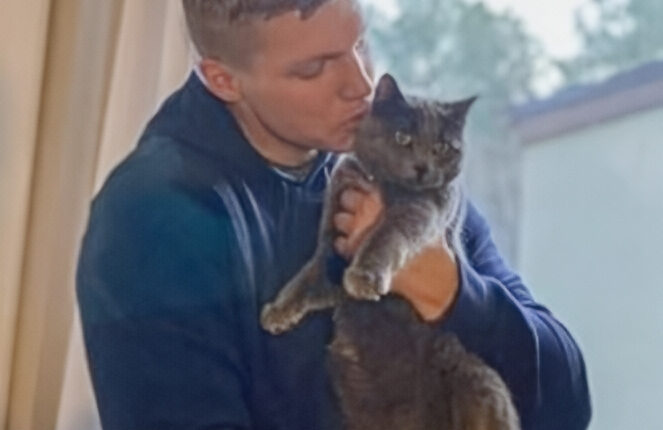 Garrison Brown With Catthew When he First Rescued Him – Instagram